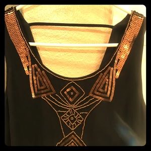 Black dress with gold metallic sequins